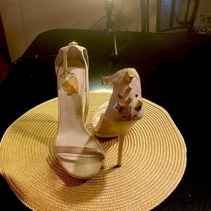 White and gold stilettos